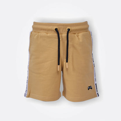 Beige shorts with black drawstring and white side strip on a light gray background
